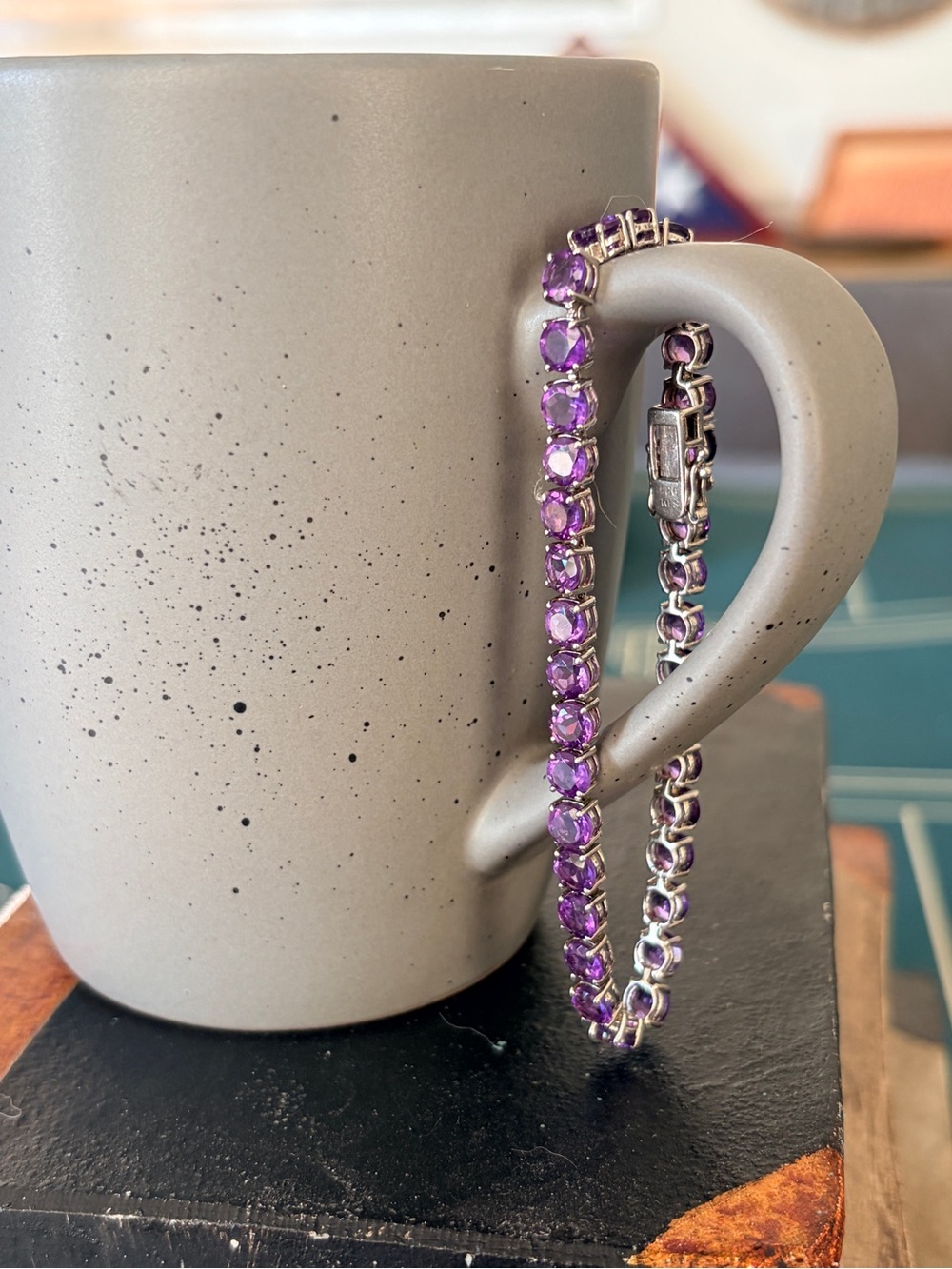 Natural amethyst stones in sterling silver tennis bracelet.